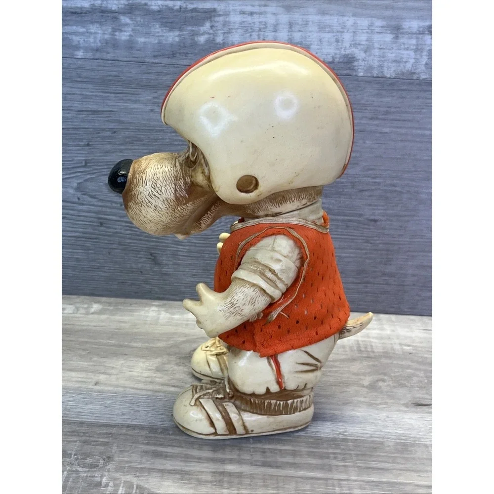 1977 Creative Mfg Orange Football Player Hound Dog Plastic Coin Bank Vintage 70s